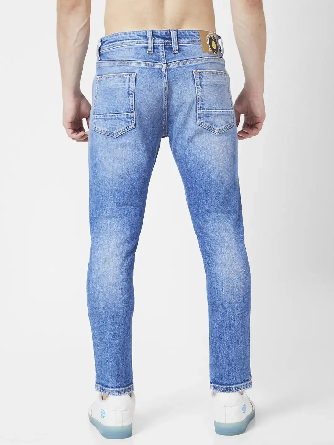 Spykar Men Mid Blue Cotton Slim Fit Tapered Length Mild Distressed Mid Rise Jeans (Kano)